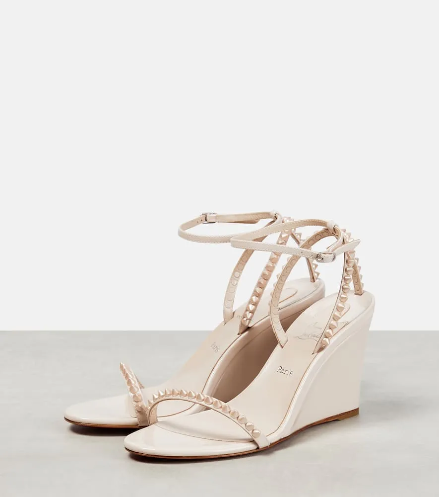 Christian Louboutin Embellished patent leather wedge sandals